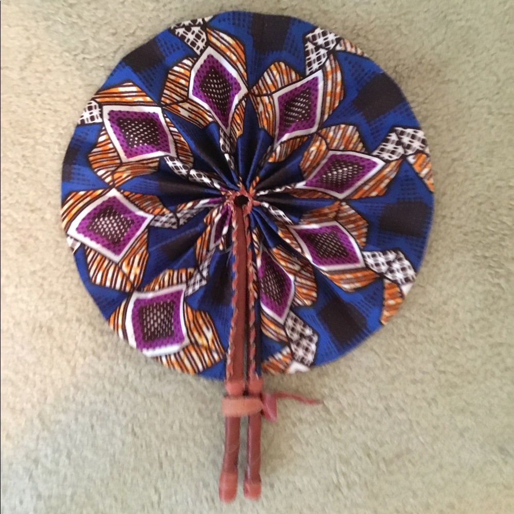 Beautiful leather and cloth fan.